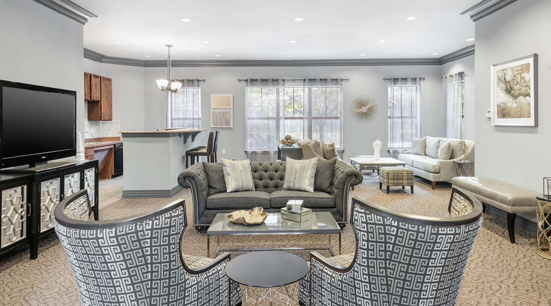 Access to resident-only features a clubhouse with a tv and seating